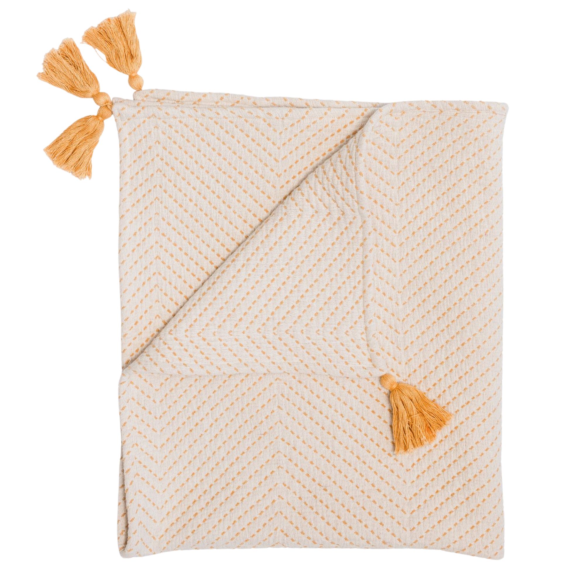 Orange muslin blanket on white background