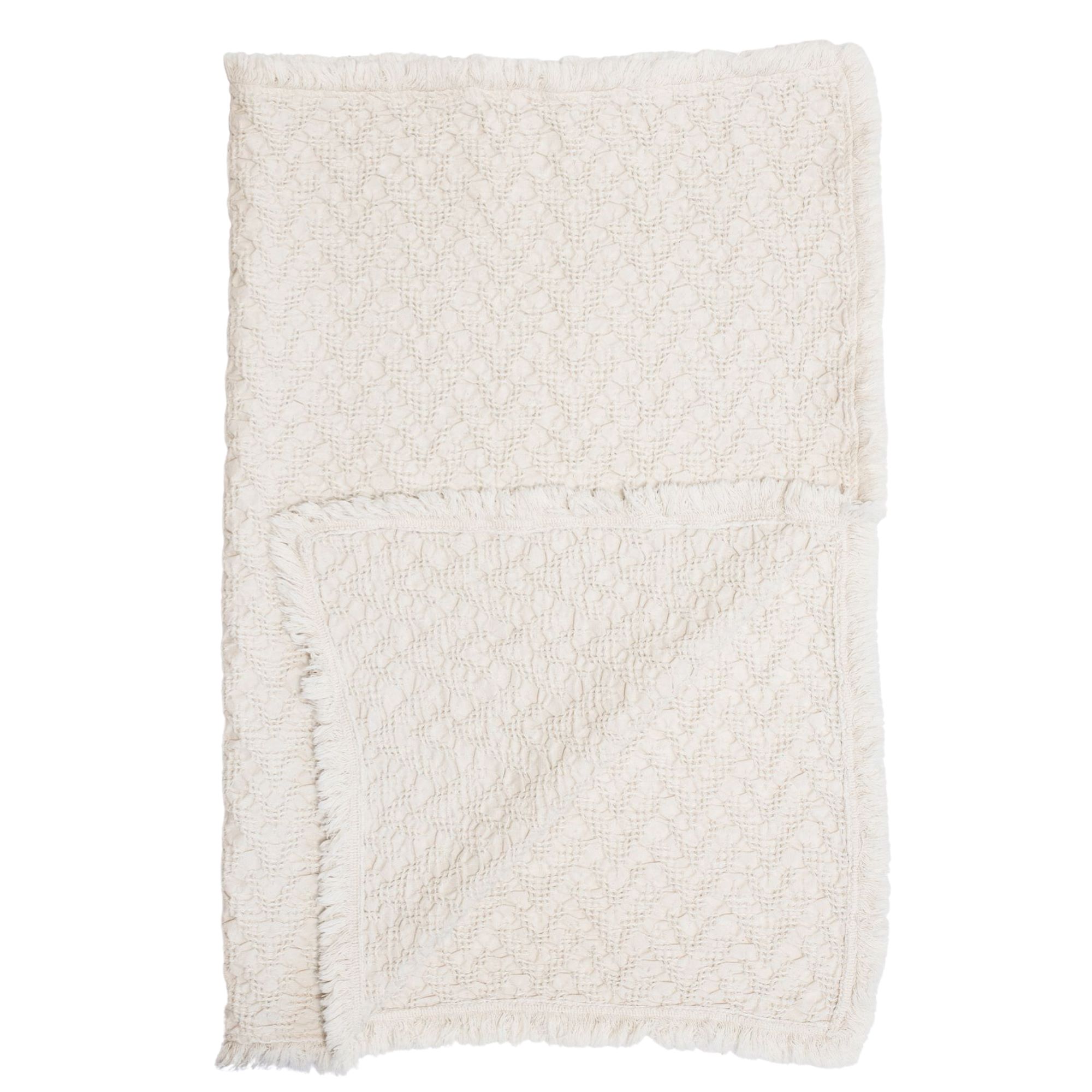 White muslin blanket on white background